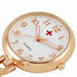 Rose gold clip-on nurse watch with medical cross and chain link design