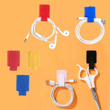 Colorful cable organizer straps holding USB cables